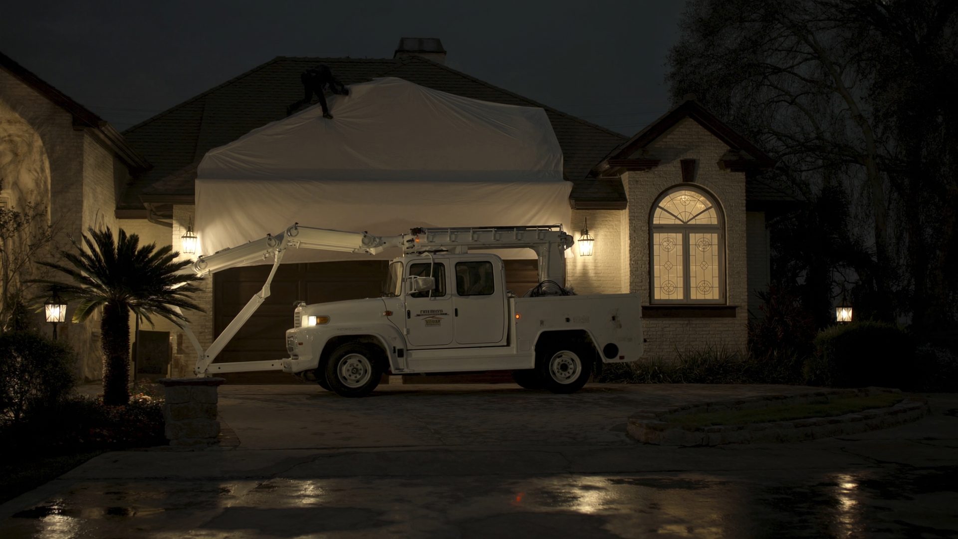 An Arthur's Roofing response at night — calm, prepared, and on the way